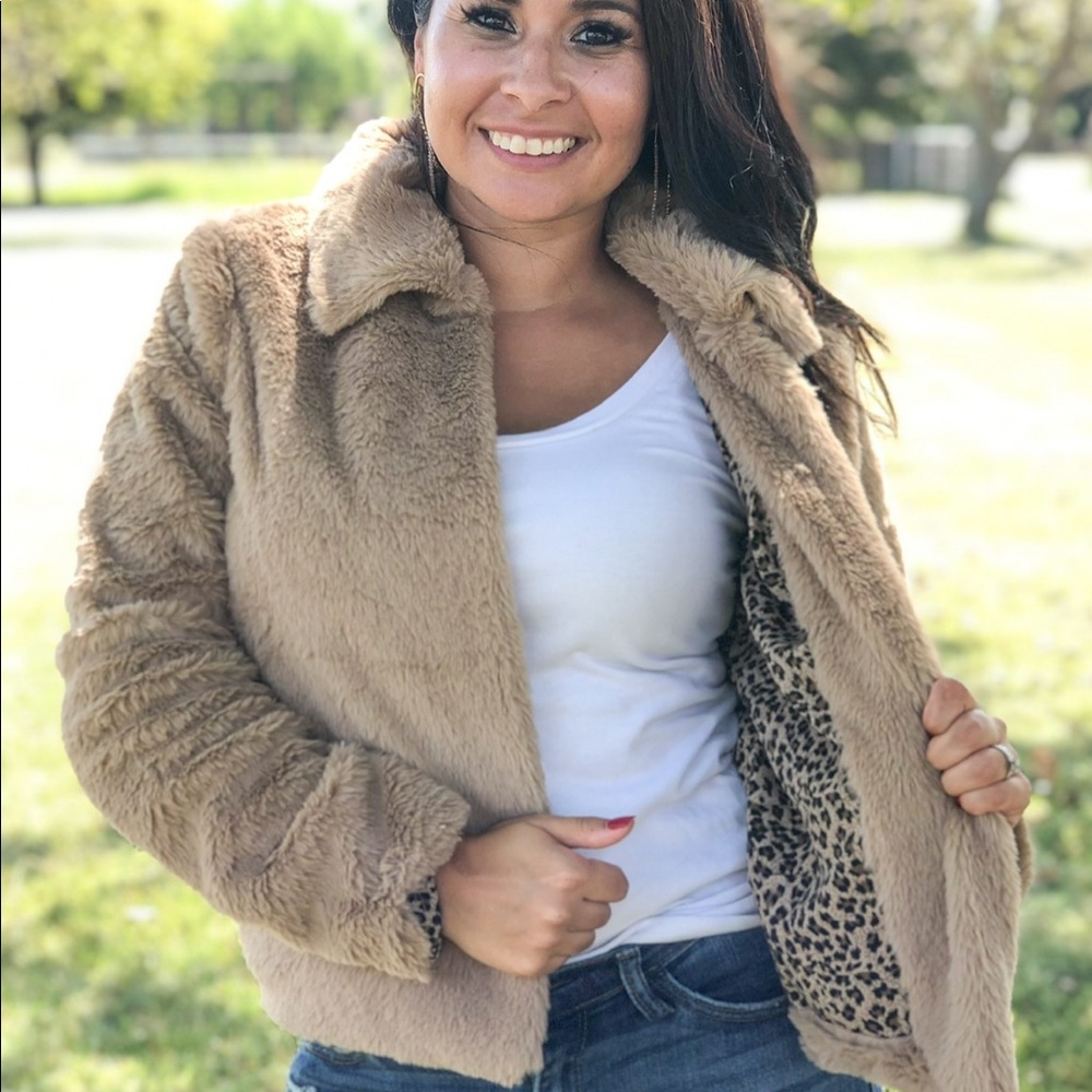 Faux fur jacket. Worn once. Leopard inside. Size small
